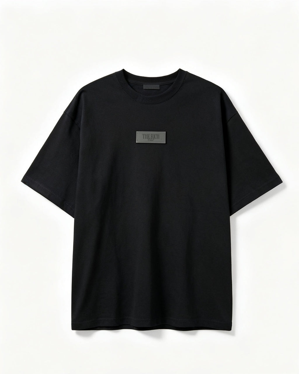 Heavyweight Tee in Black, flat lay. AI placeholder v2 (pre-production preview, not the final product)