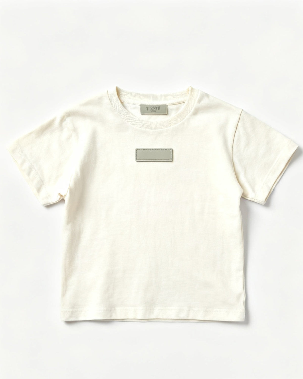 Heavyweight Tee (Kids) in White, flat lay. AI placeholder v2 (pre-production preview, not the final product)